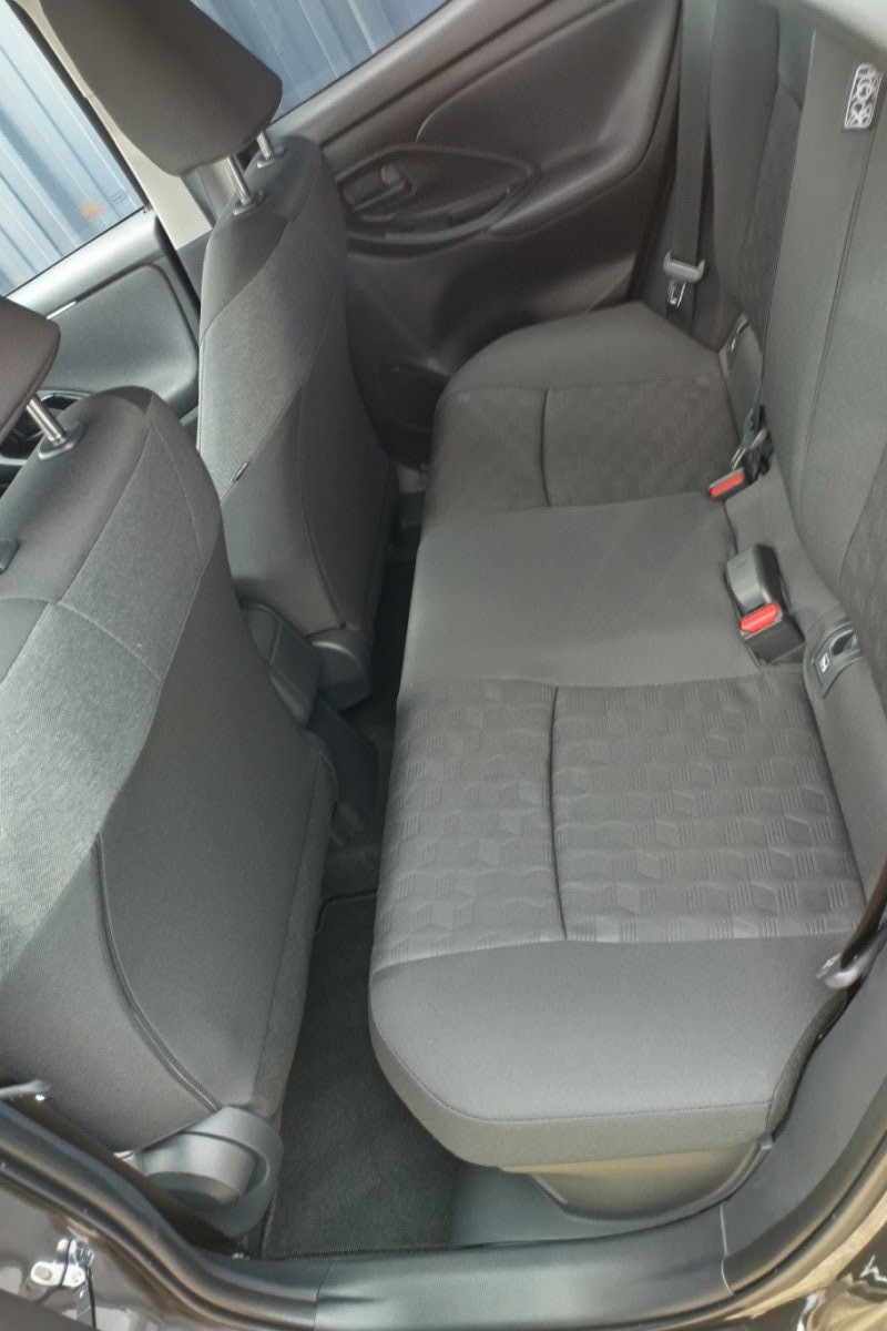 Rear seat view of Toyota Yaris Hybrid for rental in North Cornwall