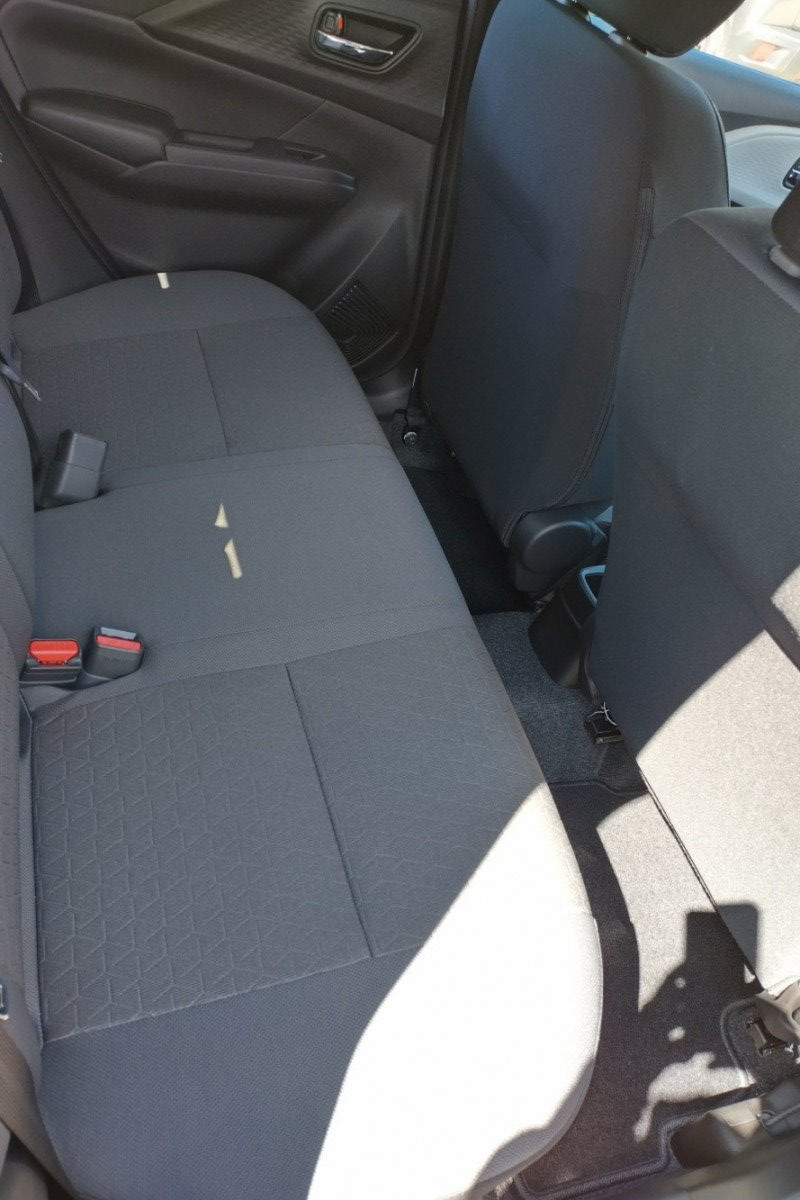 Rear seat view of Suzuki Swift for rental in North Cornwall